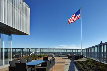 Rooftop Decks with Grills, Fire Pits, and Views of Mount Rainier, Lumen Field, Puget Sound, and Downtown Seattle